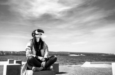pretty girl outdoor enjoying virtual reality glasses